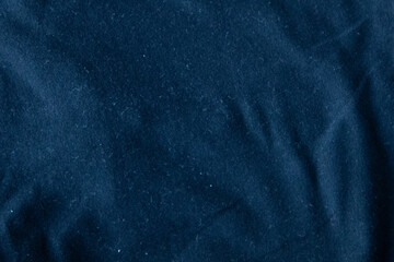 Black dark blue canvas fabric cotton background with folds copy space - obrazy, fototapety, plakaty