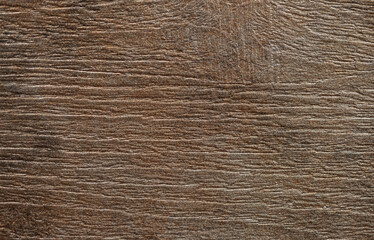 Brown background from decorative plaster with abstract spots. Unusual beige wall texture with beautiful patterns, creative surface background. Front covering for facing of buildings.