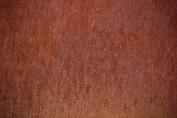 Texture of rusty iron, cracked paint on an old metal surface. Sheet of rusty metal with cracked and peeling paint, background for design with copy space.