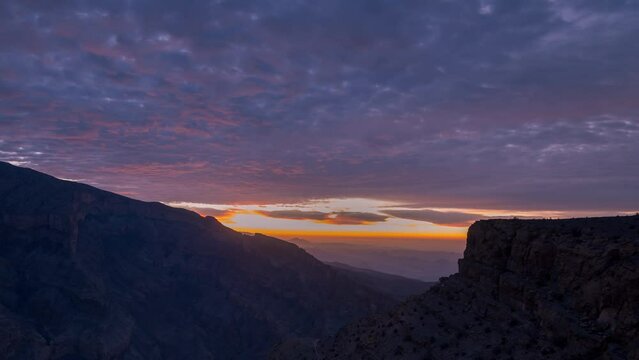 Sunrise sky 4K time lapse on the Jebel shams mountain in Oman