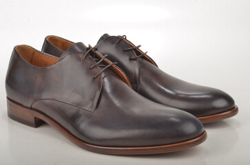 pair of black leather shoes