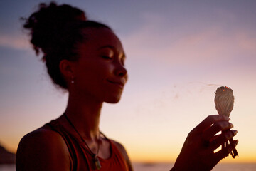 Black woman, meditation and mindfulness, burning sage for zen and cleanse, therapy and spiritual...