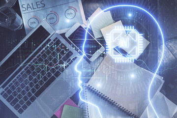 Double exposure of brain drawing hologram over topview work table background with computer. Concept of big data.