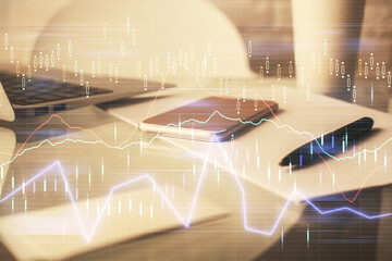 Double exposure of forex graph drawing and cell phone background. Concept of financial data analysis