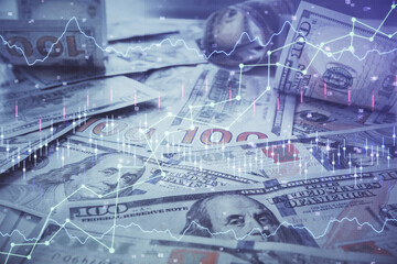 Multi exposure of forex chart drawing over us dollars bill background. Concept of financial success markets.