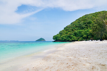 Beautiful tropical landscape. Sandy beach with blue clear water.