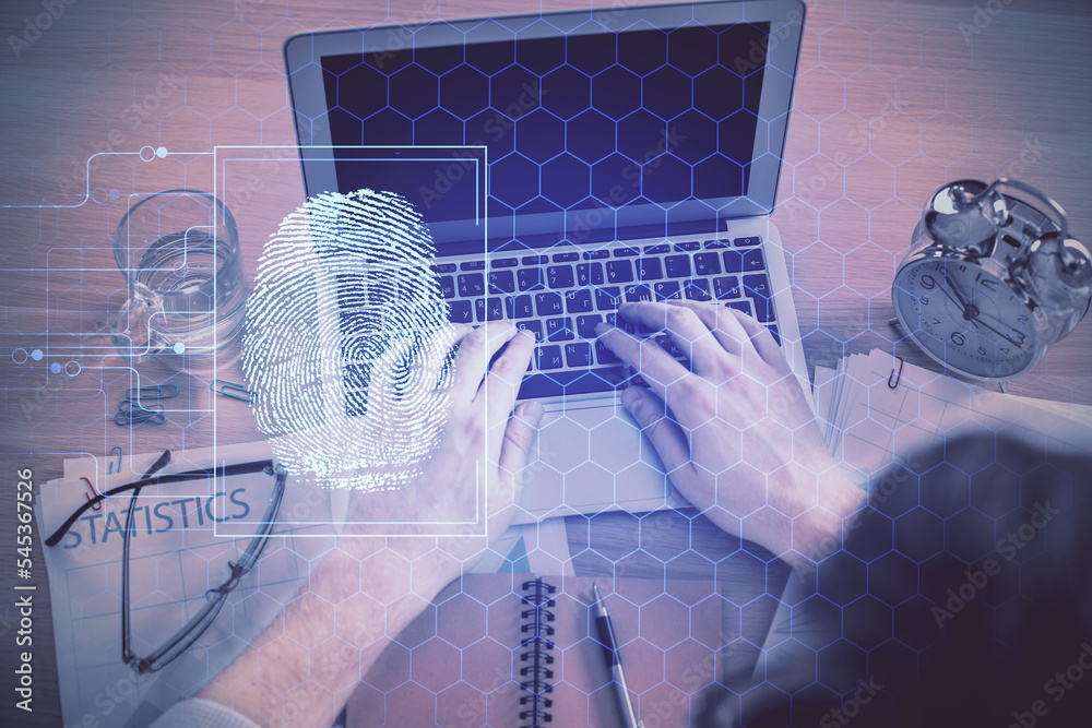 Poster Double exposure of man's hands typing over computer keyboard and finger print hologram drawing. Top view. Personal security concept.