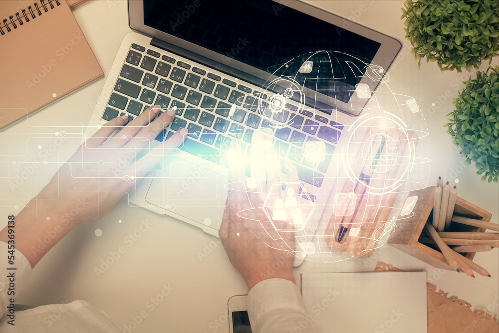 Poster double exposure of woman hands working on computer and social network theme hologram drawing. top vi