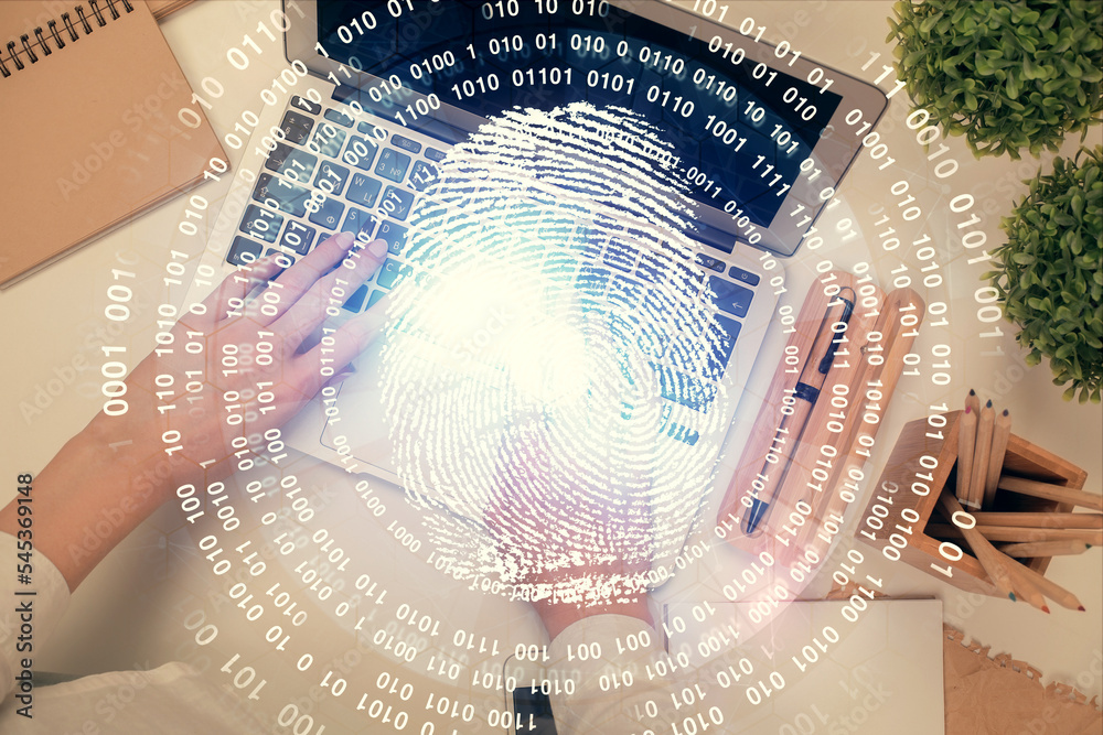 Aufkleber double exposure of woman hands working on computer and fingerprint hologram drawing. top view. digit