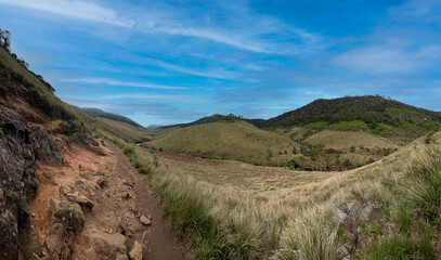 Way through Horton plateau surrounded by mountains in Sri Lanka landscape 