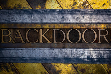 Backdoor text with on grunge textured copper and gold background