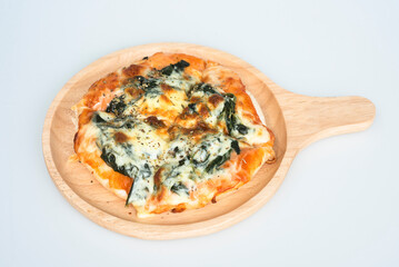 Pizza on a wooden tray on a white background
