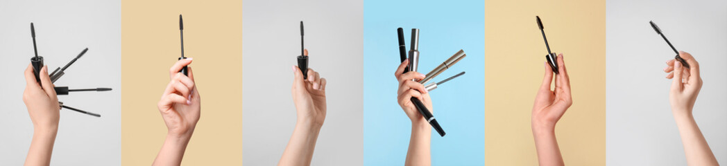 Set of mascara with brushes in female hands on color background