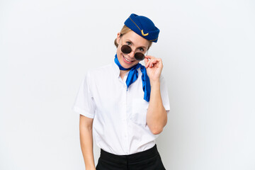 Airplane blonde stewardess woman isolated on white background with glasses and happy