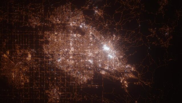Boise (Idaho, USA) aerial view at night. Satellite view on modern city with street lights. Camera is flying above the city, moving forward