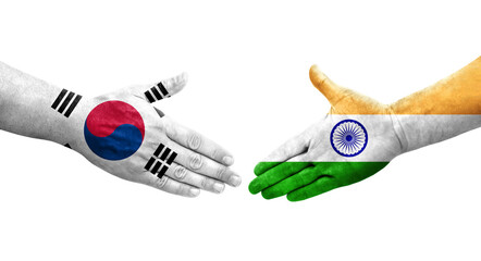 Handshake between South Korea and India flags painted on hands, isolated transparent image.