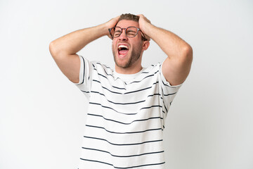 Young handsome caucasian man isolated on white background stressed overwhelmed