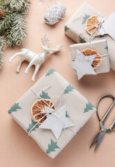 Christmas  gift boxes, clews of rope, paper's rools and decorations.