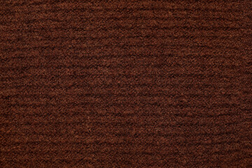 Closeup view of brown knitted fabric as background