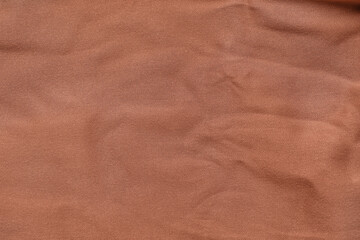 Closeup view of brown fabric as background