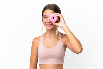 Little caucasian girl isolated on white background holding a donut and happy