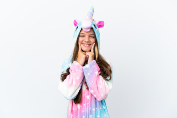 Little caucasian girl wearing unicorn pajama isolated on white background smiling with a happy and pleasant expression