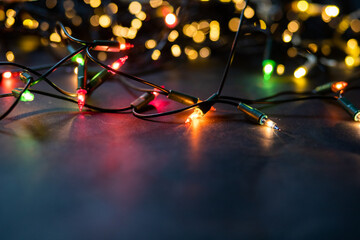 christmas string lights and bokeh holiday background