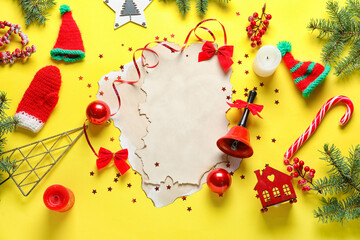 Fototapeta na wymiar Composition with blank letter to Santa, Christmas decorations and candles on yellow background