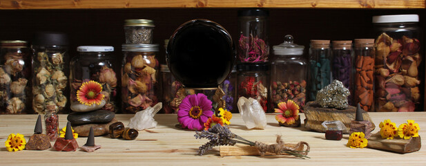 Meditation Altar With Rock Crystals and Flowers. Jars of Herbs in Background