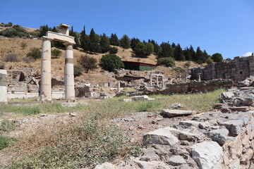 Fototapeta na wymiar Pillars in the ruins of Ephesus old city, Selcuk, Izmir, Turkey