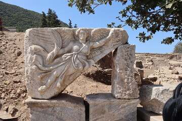 Stone carving of goddess Nike, Ephesus or Efes, Kusadasi, Turkey. The Greek goddess of Victory, at...