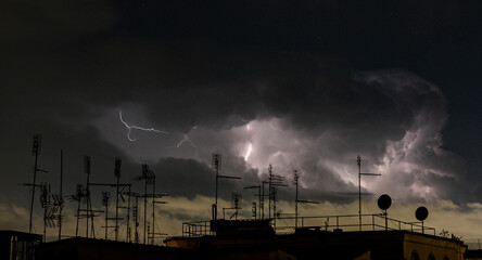 Lightning storm at night over Rome, Italy