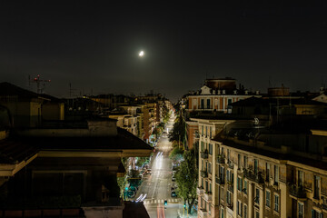 The moon at night over Via Tagliamento, Rome, Italy