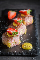 Delicious sweet sushi with chocolate and mango.