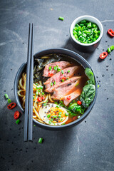 Tasty and hot Ramen soup served with chive and sesame.