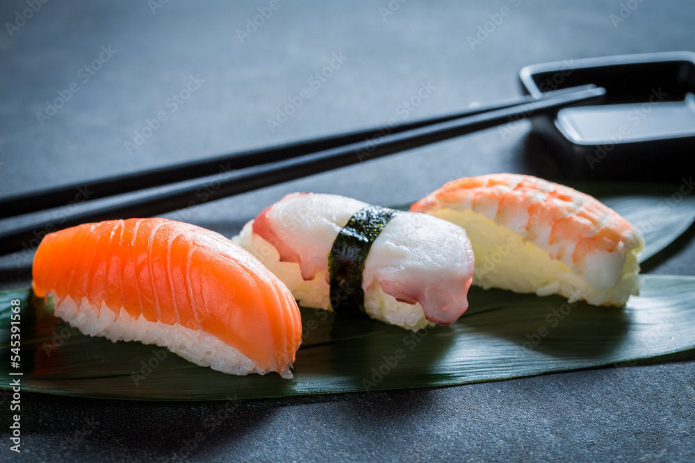 Wall mural fresh and colorful nigiri sushi made of seafood.