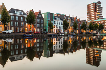 New modern residential buildings along the canal in the Vathorst district in Amersfoort. in the Netherlands.