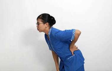 Young asian employee suffering from back pain. Isolated on white with copyspace