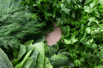 Autumn harvest. Greens and vegetables frame. to cook. Grocery background. Health food. Vegetarian. View from above. Place for text.