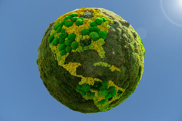 Green planet Earth from natural moss. Symbol of sustainable development and renewable energy