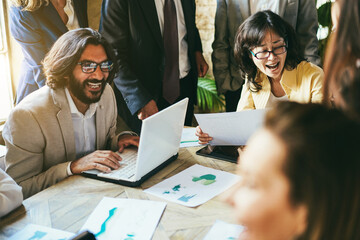 Multiracial business people working inside bank office - Focus on senior asian woman face