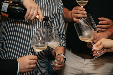 We open a bottle of white red or rosé sparkling wine and pour into glasses for a great friendship with wine lovers.
