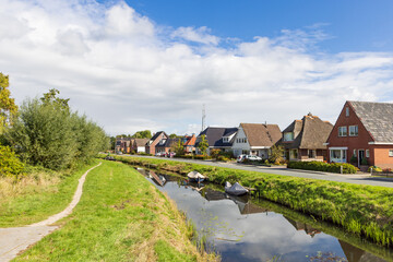 Fototapeta na wymiar Scenic view of small village Briltil, municipality Westerkwartier in Groningen province in the Netherlands