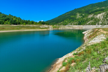 Amazing view of curvy, meandering Zavoj lake on Old Mountain, Serbia. Zavojsko Lake near Pirot