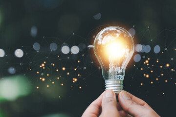Bright light bulb and icon with book. Business success idea and education or learning online...