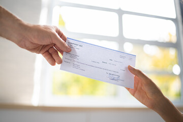 Payroll Cheque. Giving Paycheck Compensation
