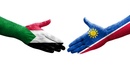 Handshake between Sudan and Namibia flags painted on hands, isolated transparent image.