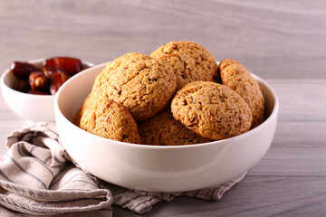 Sticky date cookies in bowl