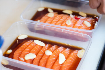 Fresh Salmon with Japanese Soy Sauce, pickled in the box, is a combination of Japanese and Korean food.