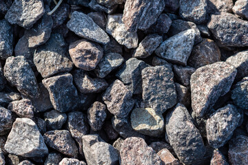 Rocas, gravas y piedras partidas. Material de construcción. Fondo para recursos gráficos